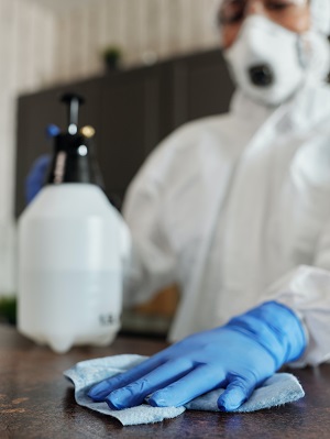 person-wearing-blue-latex-gloves-and-face-mask-4099266.jpg